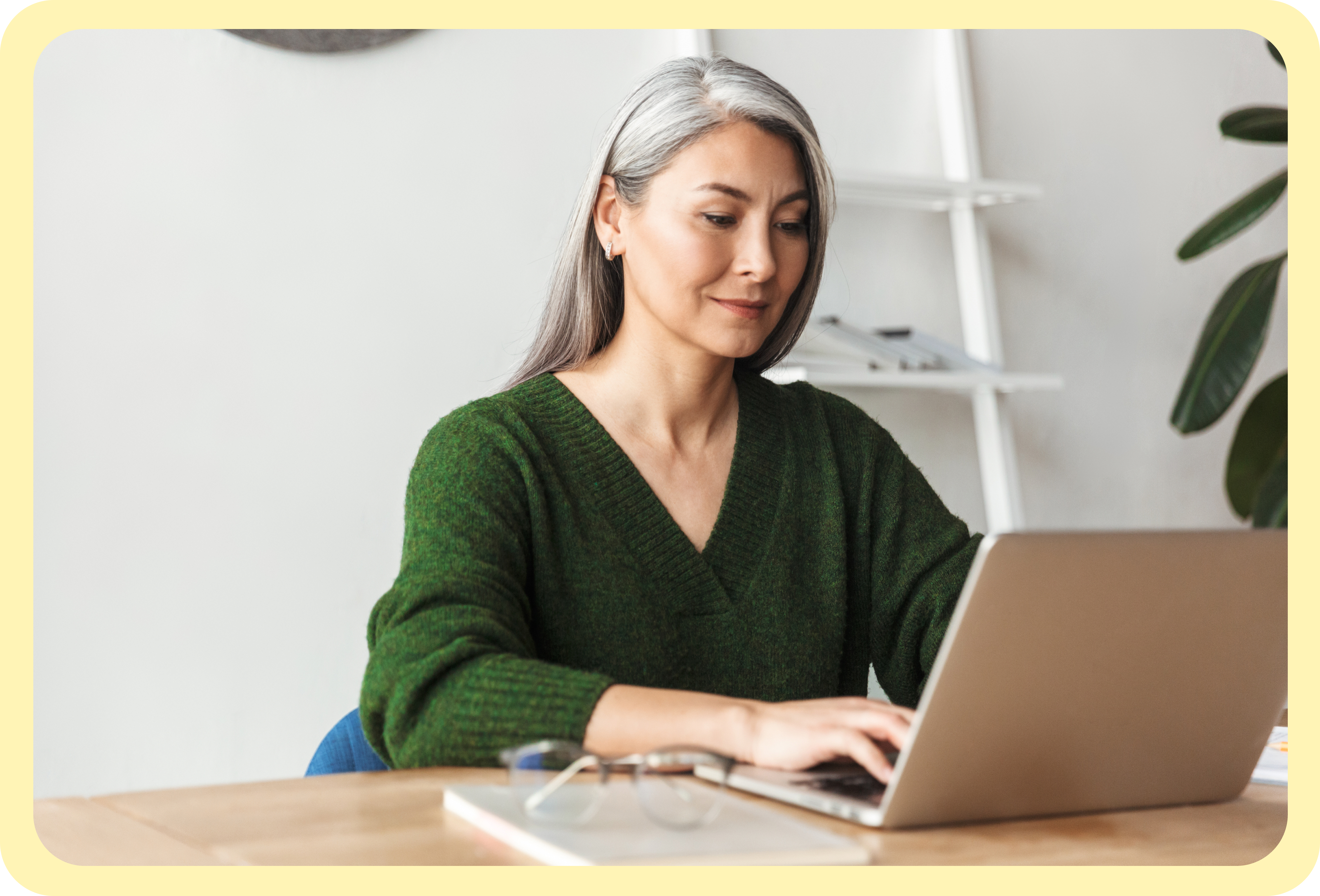 A woman working with Therap application on her laptop